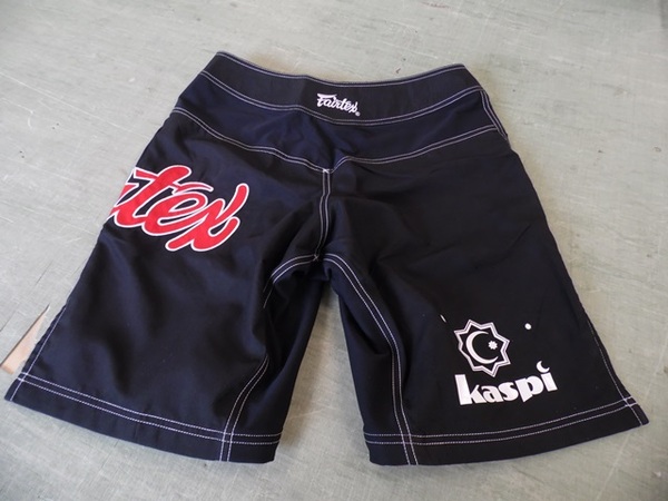 Lasten shortsit logolla Lasten shortsit logolla